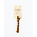 A skein of burnt sienna embroidery floss, twisted and bundled, with a cream and black label featuring the brand name and color information.