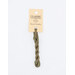 A skein of dark sage embroidery floss, twisted and bundled, with a cream and black label featuring the brand name and color information.