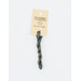 A skein of blue gray embroidery floss, twisted and bundled, with a cream and black label featuring the brand name and color information.