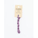 A skein of light violet embroidery floss, twisted and bundled, with a cream and black label featuring the brand name and color information.