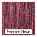 Swatch of mauve colored threads