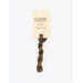A skein of brown embroidery floss, twisted and bundled, with a cream and black label featuring the brand name and color information.