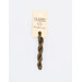 A skein of walnut embroidery floss, twisted and bundled, with a cream and black label featuring the brand name and color information.