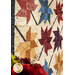 A close up on the patchwork of the quilt, demonstrating fabric, print, and top quilting details.