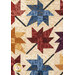 A head-on close up on the patchwork of the quilt, demonstrating fabric, print, and top quilting details.