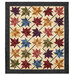 The Fluttering Leaves quilt, colored in colorful fabrics from the Flossie's Flowers collection by Henry Glass and isolated on a white background.