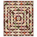 The completed Skip to My Lou Quilt colored in the warm prints of the Rustle collection, isolated on a white background.