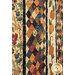 A super close up on the precise on-point square patchwork of the quilt, demonstrating fabric colors and details.