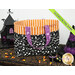 The complete Fat Quarter Tote colored in Halloween fabric from the Witchy Woods collection, staged on a dresser covered in a spiderweb tablecloth set with a haunted house and witch hat.