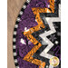 A close up on the outer edge of the topper, showcasing the prairie points and fabric details.