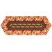 The Easy Striped Table Runner colored in vibrant autumn-themed fabrics from the Gather With A Grateful Heart collection by Timeless Treasures Fabrics, isolated on a white background.