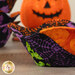 A super close up on one of the bowl cozies, demonstrating fabric colors and print details.