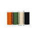 Four spools of thread in orange, green, cream, and black, isolated on a white background.