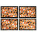 The four completed Self-Binding Placemats, colored in orange and black fabrics from the The Boo Crew collection by Northcott Fabrics, isolated on a white background.