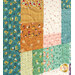 A stylized close-up image on the patchwork, showcasing the fabric and top quilting details.