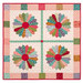 The completed Dresden Wall Hanging, colored in lovely pink, green, orange, teal, red, and purple calico fabrics from the Gentler Times collection, isolated on a white background.