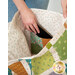 A model demonstrates the dimensional inner pocket, showing a floral print for the lining.