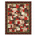 The completed Easy as ABC quilt in red, black, green, and cream fabrics from the Cardinal Celebration collection by Wilmington Prints, isolated on a white background.