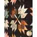 An angled shot of one of the patchwork leaf blocks, showing fabric color and print details.