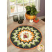 The completed Point of View Folded Star Table Topper colored in black, green, cream, and orange fabrics from the Ghoul Friends collection. The topper is staged on a wood table with coordinating Halloween decor and tableware.