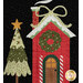 A close up on one of the window blocks, showcasing a decorated house and festive tree.