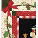 A super close up on a corner of the quilt, showcasing fabric, appliqué piece, and stitching details.