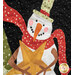 A super close up shot of the snowman decorating a tree, showcasing laser cut and embellishment details.