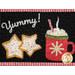 A close up on one of the window blocks, showcasing star-shaped cookies, a mug of hot chocolate, and laser-cut text that reads 