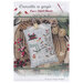 Front of pattern showing a picture of the completed project staged with winter decor.