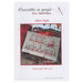 Front of pattern showing a picture of the completed project staged with christmas decor.