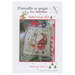 Front of pattern showing a picture of the completed project staged with christmas decor.