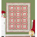 The completed Merry Mouse-mas Quilt, colored in gray, white, red, and green flannel fabrics from The Christmas Mouse collection by Northcott Fabrics, hung on a green paneled wall and staged with a coordinating pillow project and decor.