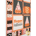 A slightly angled shot of the quilt, demonstrating fabric color and print details on the pieced borders, candy corn blocks, and a white block with appliqué text that reads, 