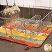 A shot of the drying mat staged with a drying rack holding two coordinating wine glasses.
