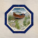 Mockup of a completed panel table topper in blue and beige fabrics in an ocean theme.