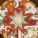 A super close up on the center folded star detail of the hot pad, showing print details and folded star elements.