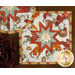 A close up on the square hot pad, demonstrating color and print details on the red, orange, and yellow fall-themed fabrics.