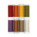 Eight spools of thread in red, orange, yellow, green, purple, brown, and cream, isolated on a white background.