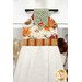 A closer look at the top of the hanging towel, demonstrating fabric colors and print details.