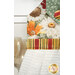 A super close up on the top of the hanging towel, demonstrating fabric colors and print details.