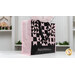 The Shabby Fabrics tote bag in black and pink, showing details on the patchwork block design and staged on the Shabby Fabrics video set.