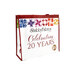 The Shabby Fabrics 20th anniversary tote bag, showing details on the rainbow patchwork block designs and text graphic, isolated on a white background.