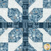 A super close up on one of the patchwork snowflakes, showing fabric colors and print details.