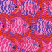 Red fabric with oceanic fish and wavy stripes.