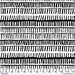 Fabric featuring black-and-white pattern of abstract stripes with a 12