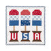 The completed July spool, three popsicles in patriotic colors, isolated on a white background.
