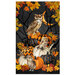 Panel fabric featuring owls, stylized pumpkins, and fall leaves on a mottled black night sky background.