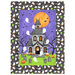 Haunted house panel featuring ghosts flying around a spooky house with headstones and pumpkins in the yard.
