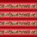 Red border print with Christmas stripes of pine branches, cardinals, poinsettias, and swirling accents.