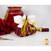 Image of the back of the angel, showing gold ribbons with color coordinated sewing clips
